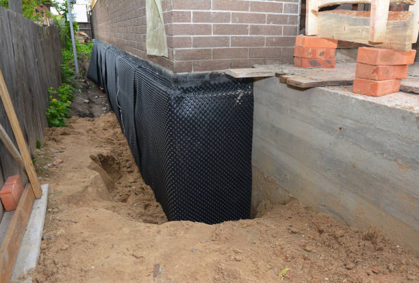 SJ Waterproofing Pros technician performing targeted Crawl Space Encapsulation assessment in Hebron, KY
